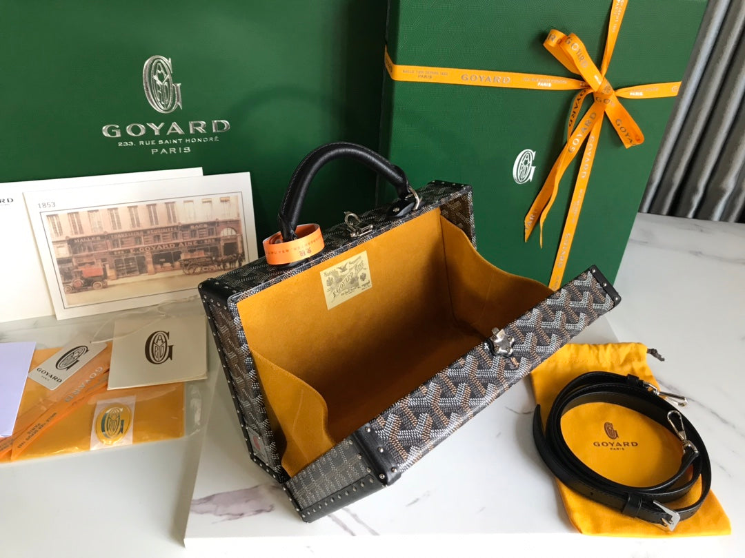 GRAND HÔTEL TRUNK BAG 24 IN BLACK GOYARDINE CANVAS AND CALFSKIN