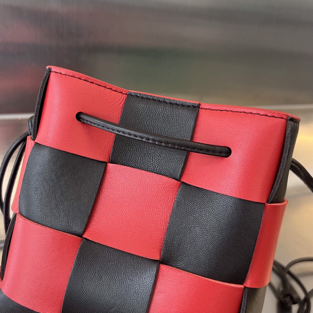 BOTTEGA VENETA SMALL CASSETTE BUCKET 18 IN RED MIX BLACK CALFSKIN