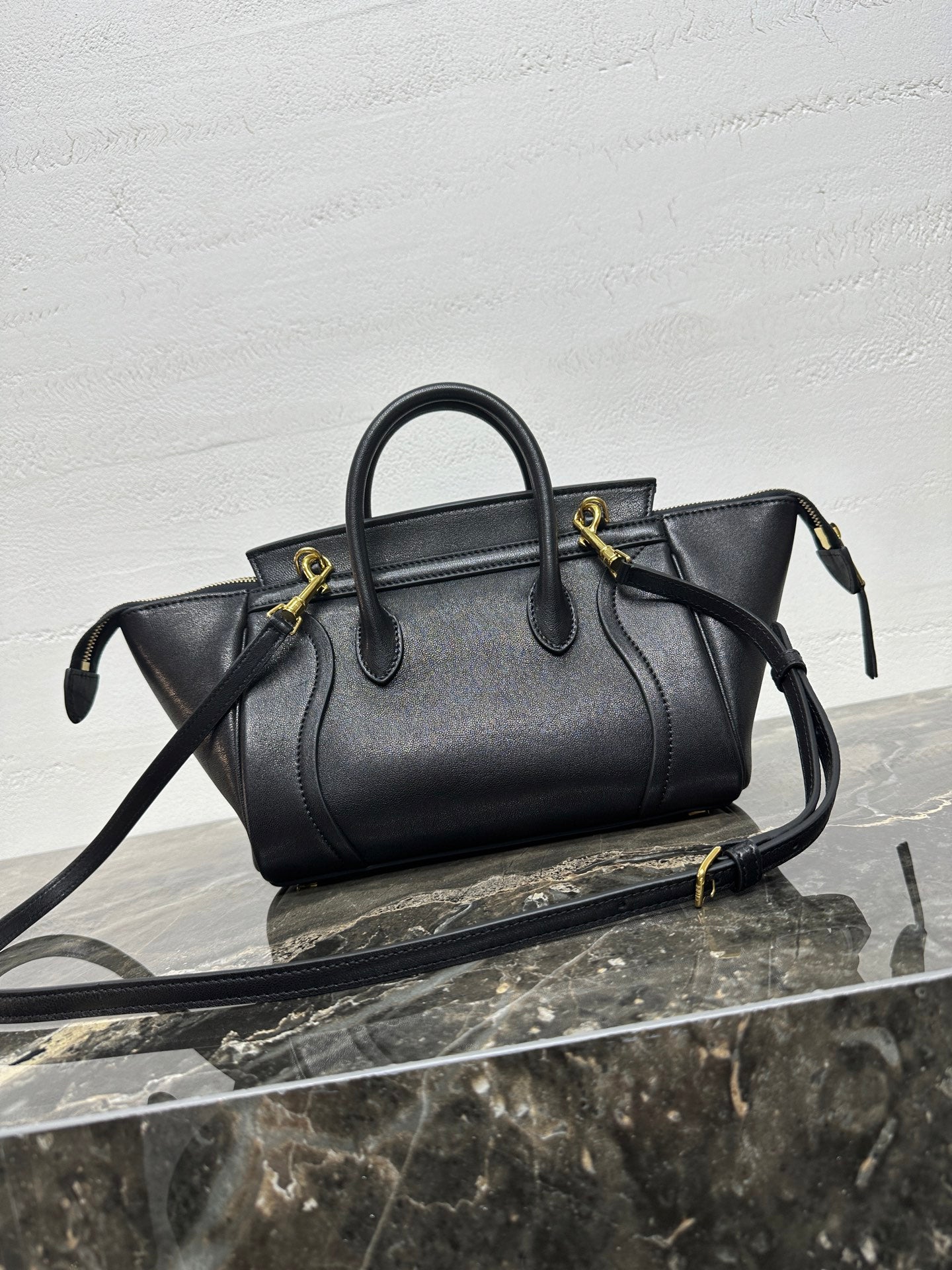 CELINE 25S NEW LUGGAGE 38MM IN BLACK SHINY LAMBSKIN GOLD HARDWARE